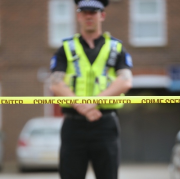 YORK, ENGLAND - APRIL 22: Police guard a home being searched at one of three locations in York as three men were arrested today in connection with the disapperance of missing chef Claudia Lawrence on April 22, 2015 in York, England. The new searches come in the wake of three arrests today in connection with the dissapearance of Claudia Lawrence who was last seen leaving work at the University of York's Goodricke College on March 18, 2009. (Photo by Christopher Furlong/Getty Images)